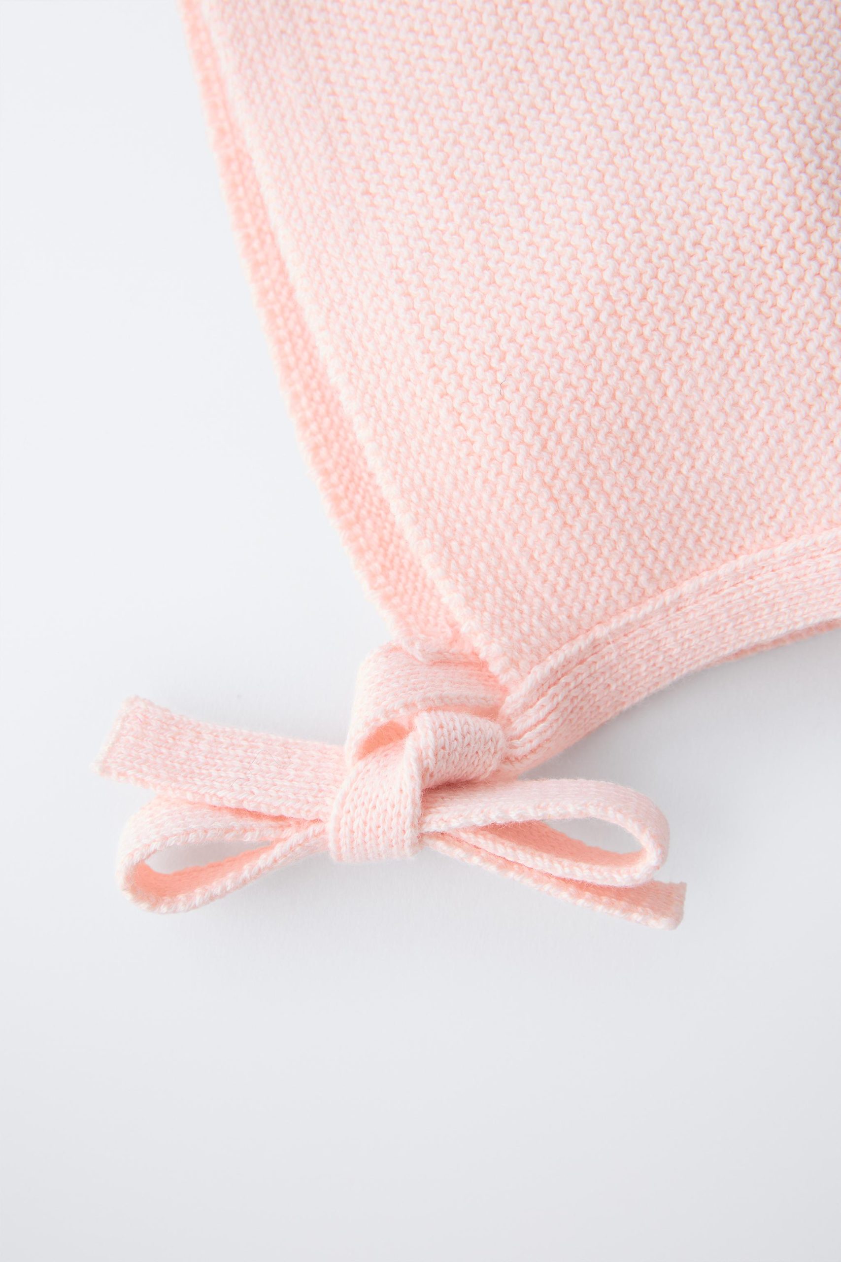 کلاه بافتنی با بند تنظیمی جلو از برند زارا (بچه گانه)