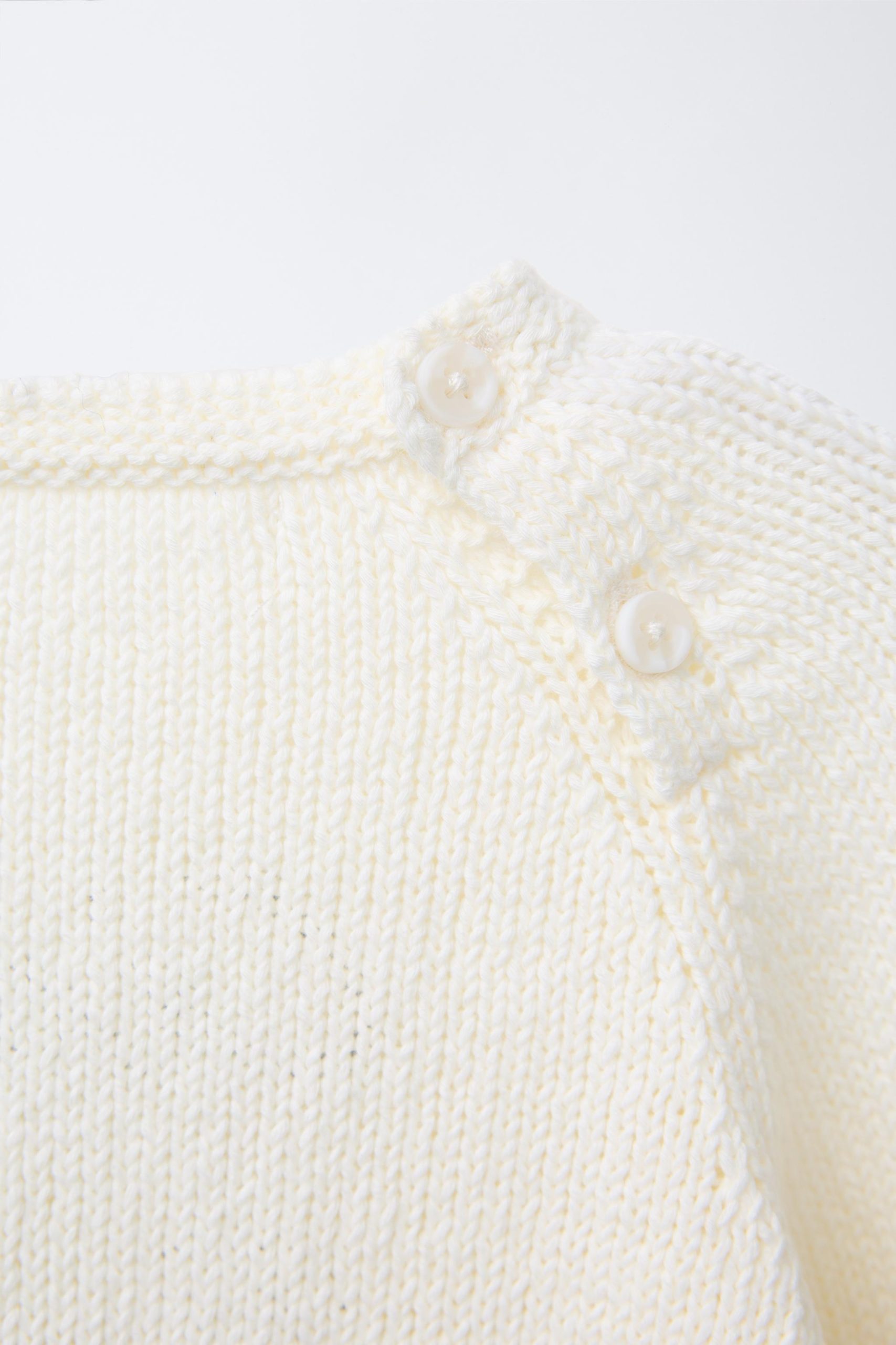 ژاکت بافتنی یقه گرد و گلدوزی از برند زارا (بچه گانه)