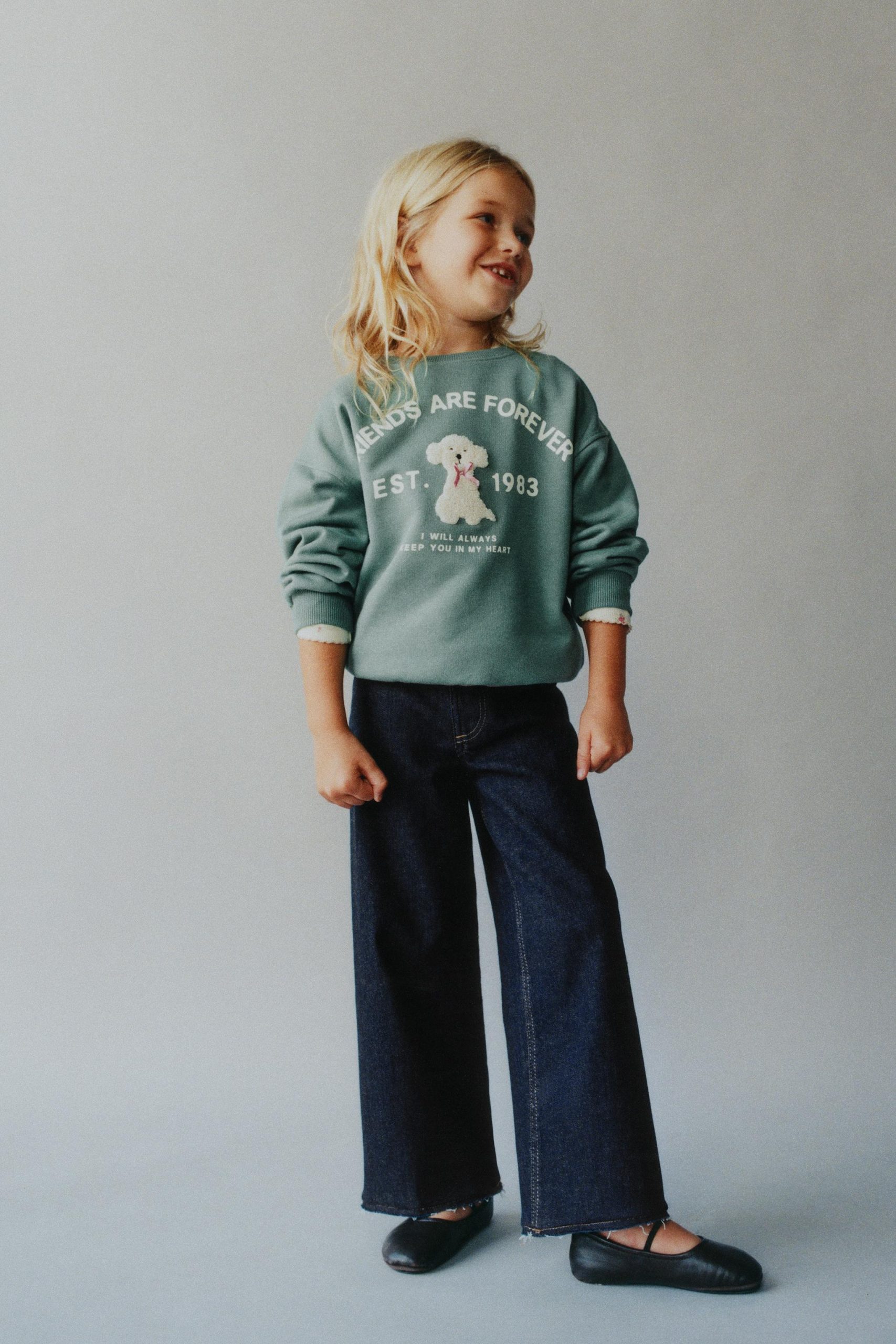 شلوار جین کمر قابل تنظیم و دکمهدار از برند زارا (بچه گانه)