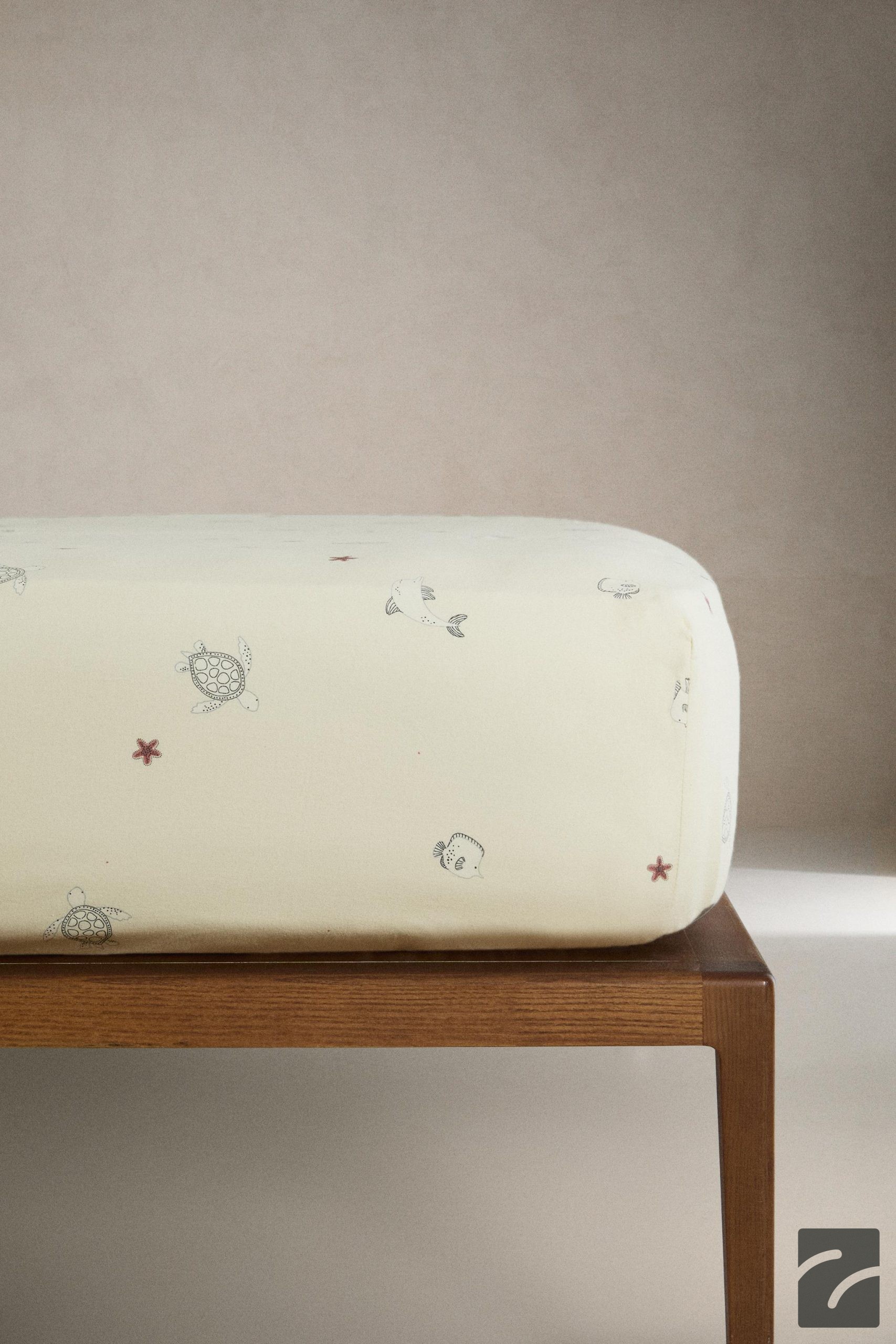 روکش زیر تشک کودک با طرح دریایی از برند زارا