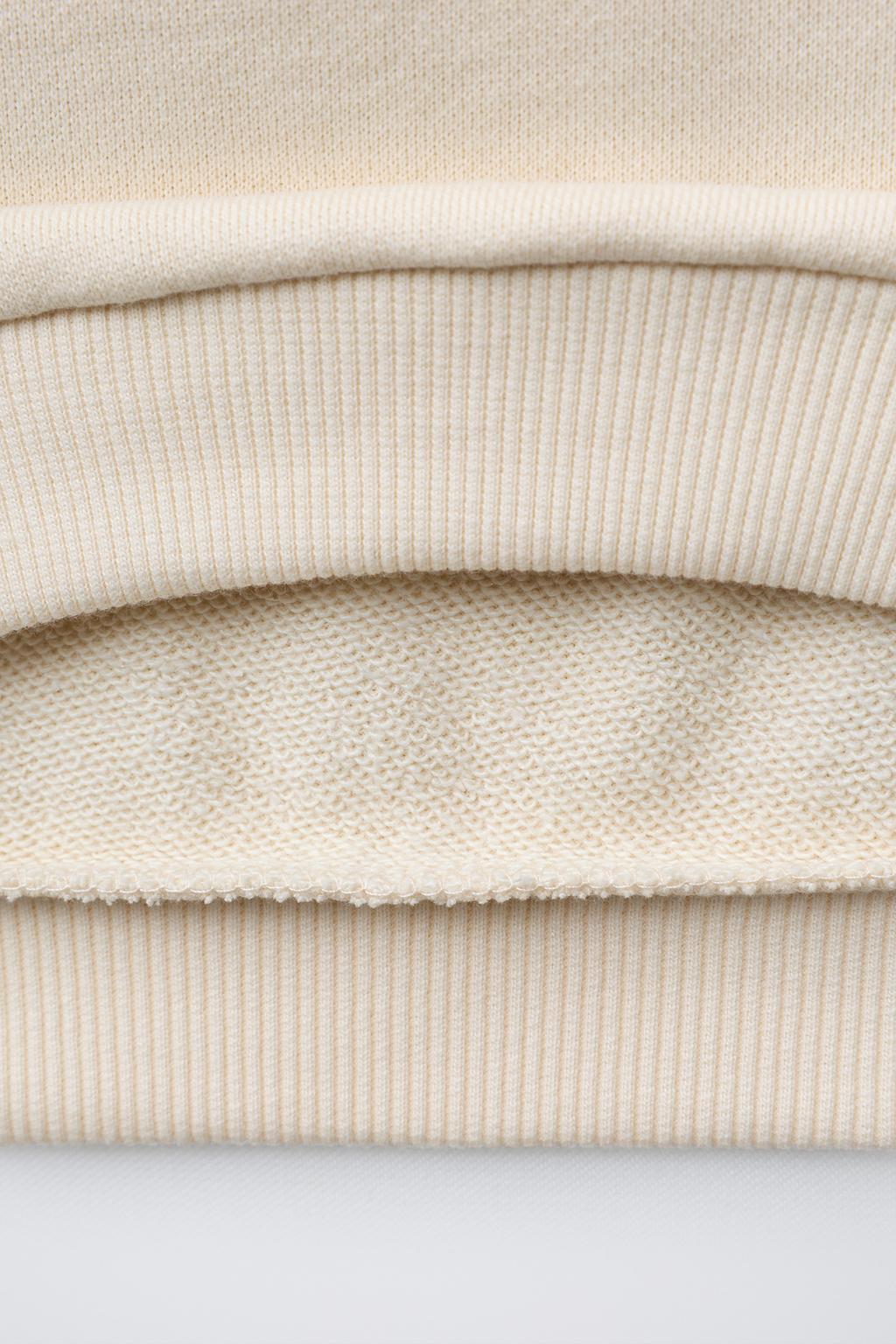 سویشرت آستین بلند یقه گرد با جیب قلبی از برند زارا