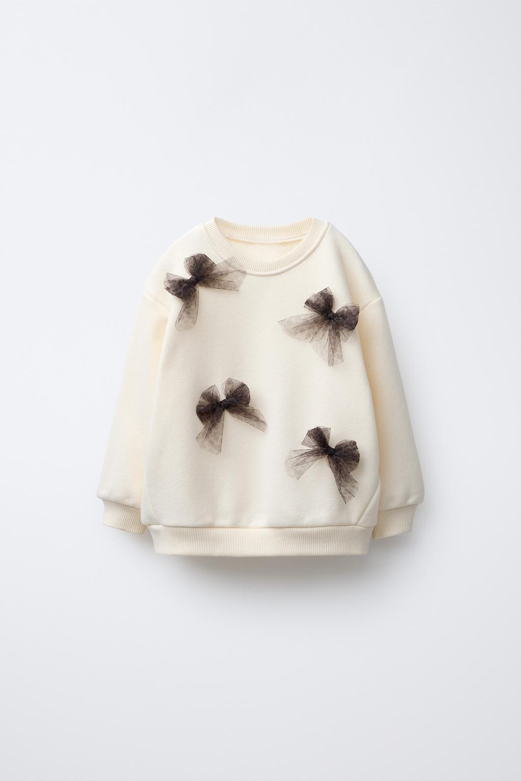 سویشرت آستین بلند یقه گرد با تزئینات از برند زارا (بچه گانه)